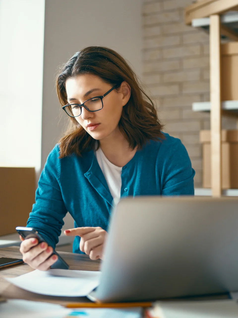 Woman happy to check her bank account balance