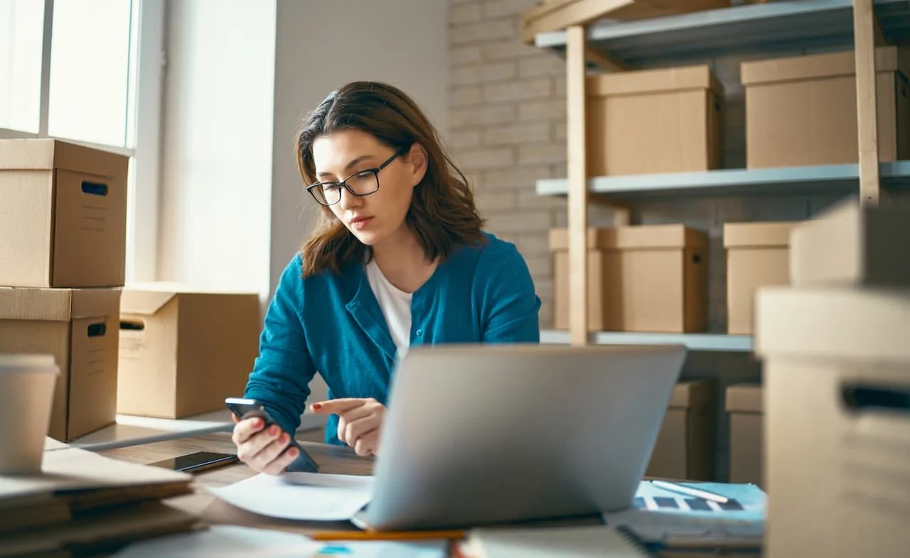 Woman working on computer.