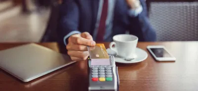 Businessman paying with credit card