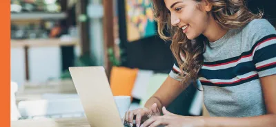 Girl using laptop to check bank account