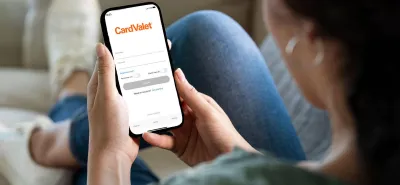 Woman looking at card valet app