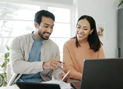Man and woman discussing financial plans