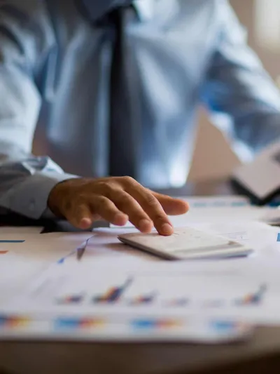 Businessman calculating Investments