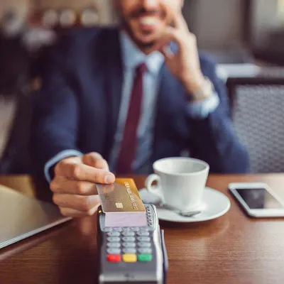 Businessman paying with credit card