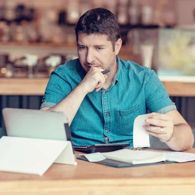 Man is worried about financial report