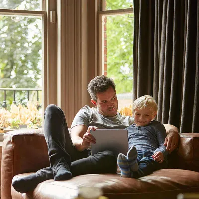 Man and son looking at tablet