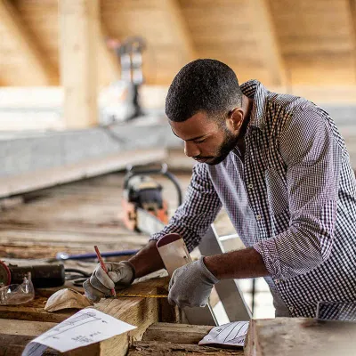 Man renovating attic