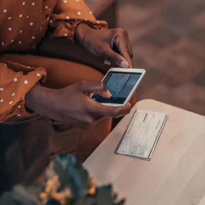 Woman using Mobile Deposit