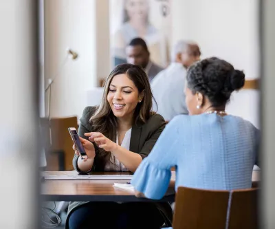 Women looking at cell phone